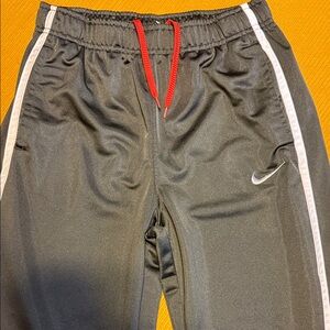 Nike Kids Black Joggers with Red Drawstring